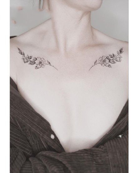 女生锁骨与颈部简单个性唯美树枝小图案纹身图片