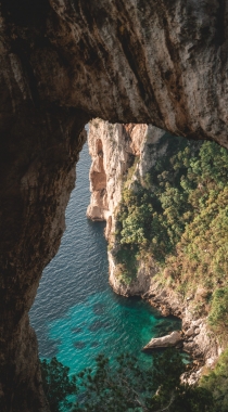 海上的礁石，溶洞风景手机背景图片组图1