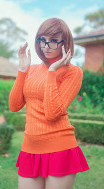 短发欧美女生橙色毛衣cosplay动漫女角色手机壁纸组图5