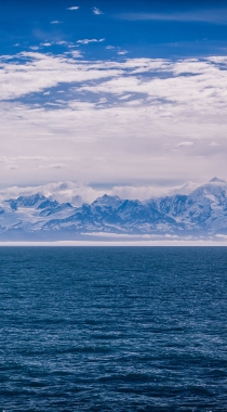 海上晚霞，海边的雪山手机壁纸套图组图11