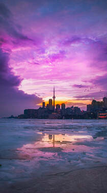 上海滩的紫色晚霞，欧美的繁华海边城市唯美手机壁纸