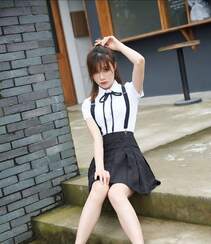 性感白衬衫黑短裙学生制服美女奶茶Emily魅惑cos女特工写真特辑组图21