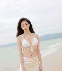 海边沙滩比基尼白裙美女安琪Yee性感旅拍写真显完美迷人身材组图1