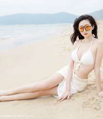 海边沙滩比基尼白裙美女安琪Yee性感旅拍写真显完美迷人身材组图13