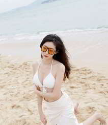 海边沙滩比基尼白裙美女安琪Yee性感旅拍写真显完美迷人身材组图21