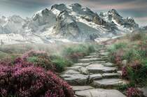 巍峨的雪山下，一条蜿蜒的石头小路唯美风景壁纸图片