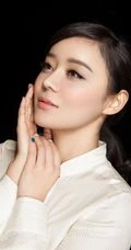 袁姗姗图片_动人白衣黄底写真（17p）