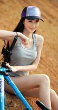 骑行天下 气质家居服妹子骑着单车户外美拍照片