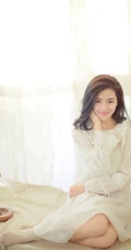 菅韧姿纯美可人白衣写真图片