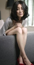 女明星吴晓敏短裤高跟床照图片