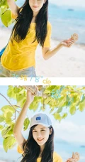 高颜值少女海礁石中戏水，黄衣短裤清新靓丽