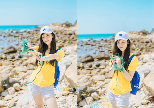 高颜值少女海礁石中戏水，黄衣短裤清新靓丽