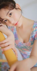 清纯白皙丸子头少女紧身连体泳装清新室内楼梯间写真