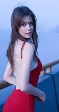 气质柔美红色露背装连衣裙欧美女生海边护栏美拍写真