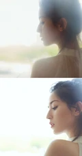 丸子头女生哈妮克孜轻纱白裙仙气十足写真图片