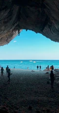 海上的礁石，溶洞风景手机背景图片