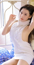 精选白皙气质线条感佳人女生露背毛衣白裙室内写真图片