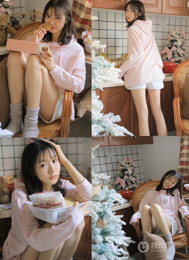 爱笑的美丽女孩，厨房一角浅粉女生粉衣短裤居家写真图片