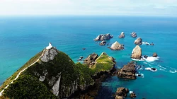 唯美的远海岛屿，水天一色的海上风景高清4K壁纸图片