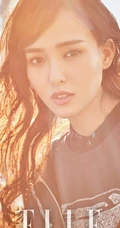 唐嫣化身温暖女汉子，湿发多变装扮登《ELLE》杂志街拍图片