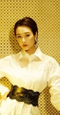 女明星李纯镂空连衣白裙套黑裙优雅写真美图