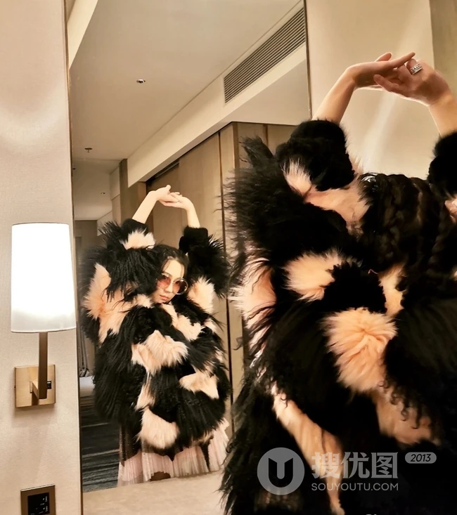 汤晶媚气质图片，女演员汤晶媚V领长裙气质匀称写真图片