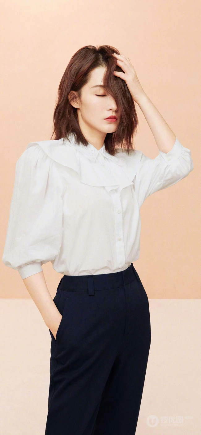 明星李沁橙色邻家女孩清纯风格写真手机壁纸