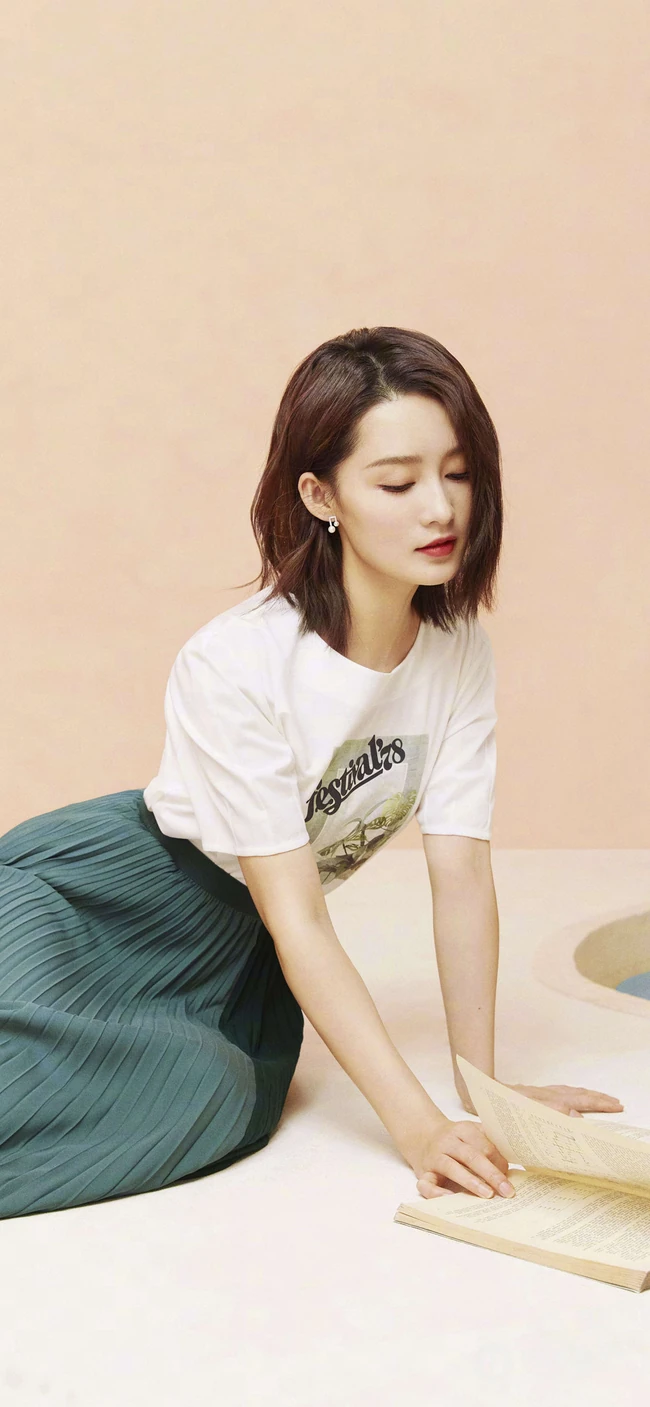 明星李沁橙色邻家女孩清纯风格写真手机壁纸