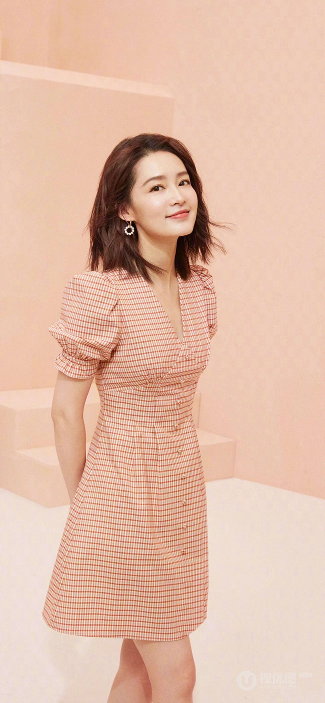 明星李沁橙色邻家女孩清纯风格写真手机壁纸