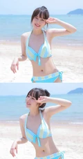 海边泳装女生，有点小微胖可爱丸子头泳装女生海边玩耍写真
