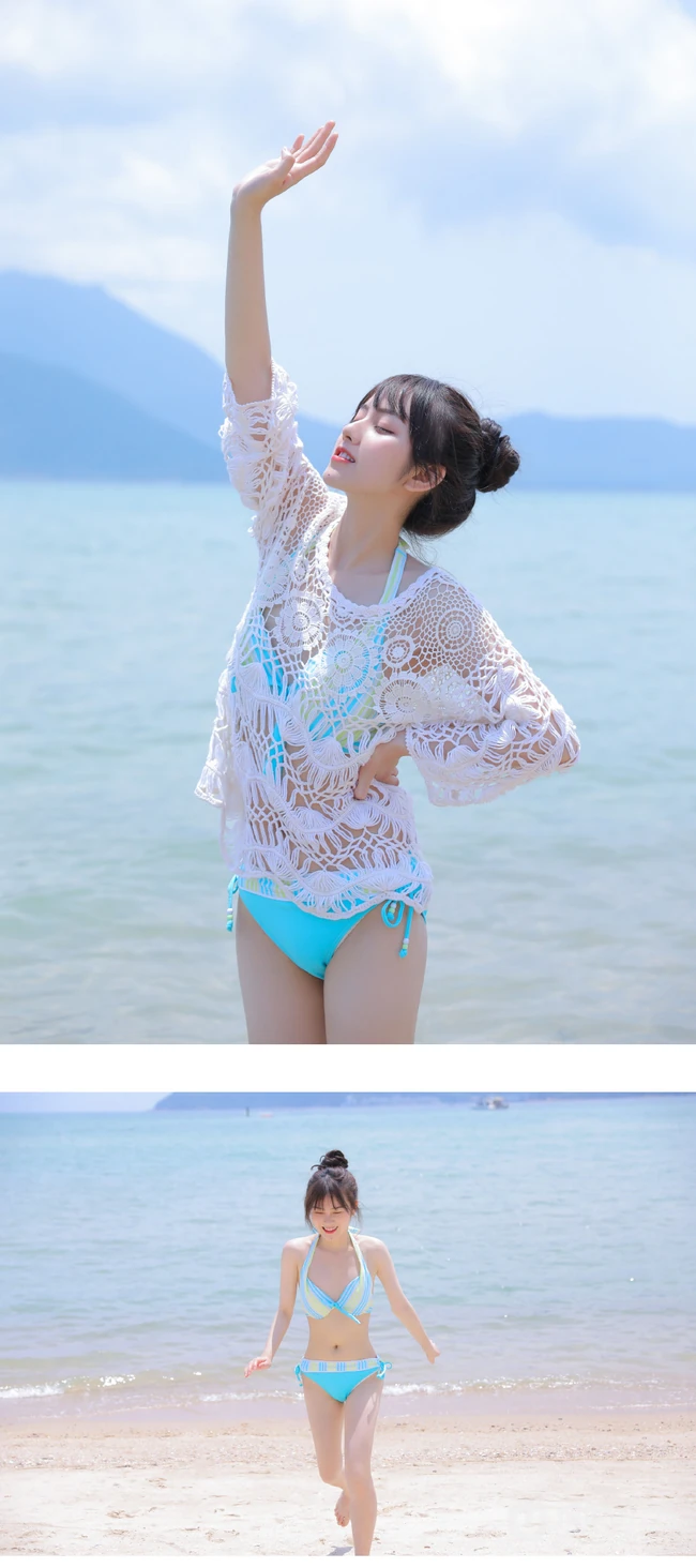 海边泳装女生，有点小微胖可爱丸子头泳装女生海边玩耍写真
