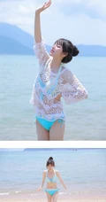 海边泳装女生，有点小微胖可爱丸子头泳装女生海边玩耍写真