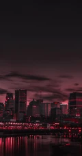 繁华城市夜景，夜间的城市街道井盖手机壁纸图片