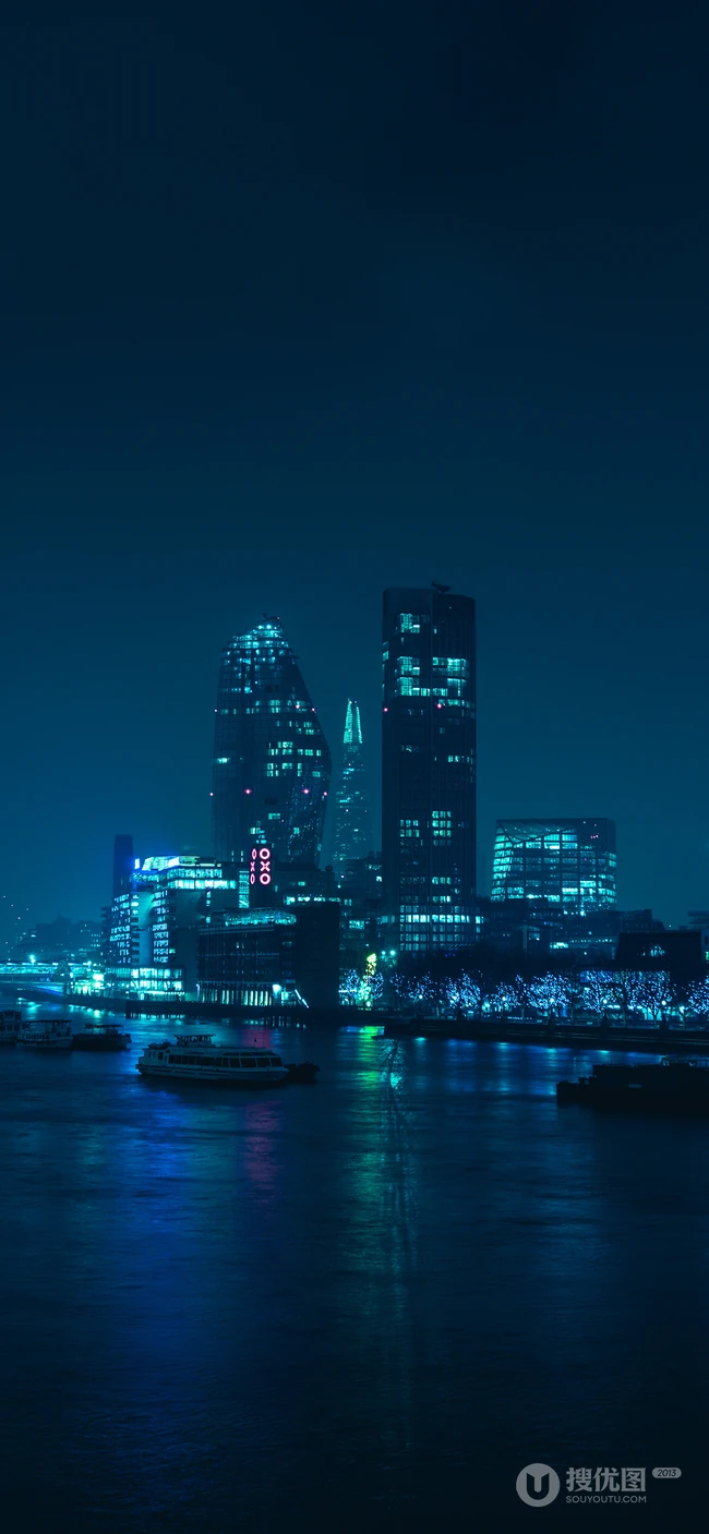 繁华城市夜景，夜间的城市街道井盖手机壁纸图片