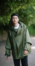 辽宁帅哥张云龙个性潮流墨绿大衣户外街拍写真照片