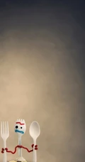棕色背景的&ldquo;机器人总动员&rdquo;萌人物影视手机壁纸