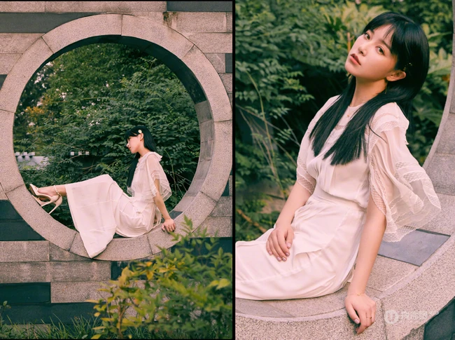 一袭白裙的阚清子清新灵动户外公园唯美动人写真图片