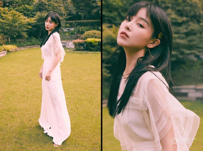 一袭白裙的阚清子清新灵动户外公园唯美动人写真图片