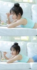 肉肉又气质的可爱丸子头微胖少女居家吃蛋糕俏皮写真图片