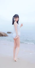 夏日海边穿着清凉的双马尾辫软可爱女生唯美清新写真图片