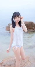 夏日海边穿着清凉的双马尾辫软可爱女生唯美清新写真图片
