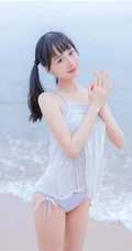 夏日海边穿着清凉的双马尾辫软可爱女生唯美清新写真图片