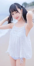 夏日海边穿着清凉的双马尾辫软可爱女生唯美清新写真图片