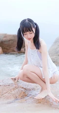 夏日海边穿着清凉的双马尾辫软可爱女生唯美清新写真图片