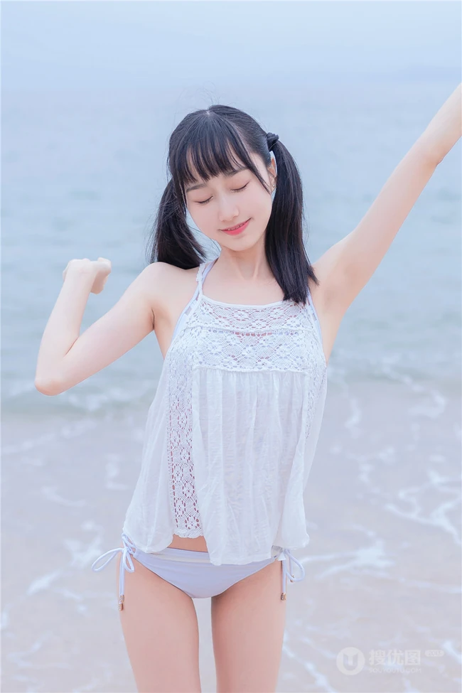 夏日海边穿着清凉的双马尾辫软可爱女生唯美清新写真图片