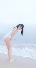 夏日海边穿着清凉的双马尾辫软可爱女生唯美清新写真图片