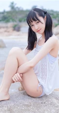 夏日海边穿着清凉的双马尾辫软可爱女生唯美清新写真图片