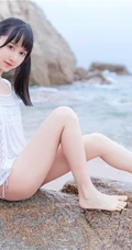夏日海边穿着清凉的双马尾辫软可爱女生唯美清新写真图片