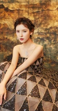 张予曦很甜很撩双丸子头卷发发型登《时尚新娘》杂志图片