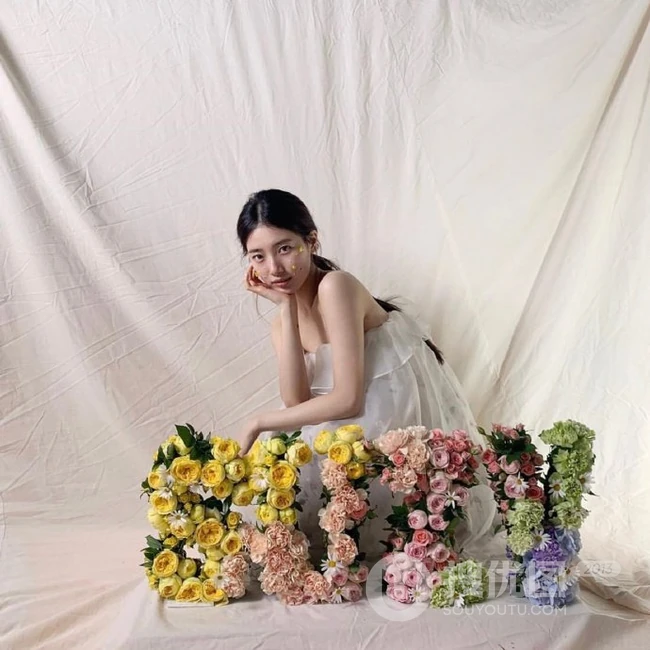 裴秀智头戴网纱搭全黑look装扮写真拍摄花絮图片